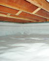 a moisture barrier installed on the walls and floors of a crawl space in Pine Mountain