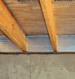 SilverGlo™ insulation installed in a floor joist in Williamson