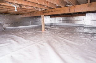 A complete crawl space vapor barrier in Lizella installed by our contractors