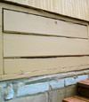 an old-fashioned crawl space door in Reynolds about to be replaced