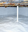 A sealed crawl space in Lizella with a vapor barrier