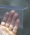 Closeup of a clear plastic covering on a Butler crawl space block wall