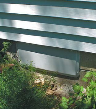 A gray crawl space vent cover in Hamilton