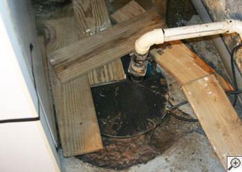 An ugly, clogged sump pump system in Lizella, Georgia
